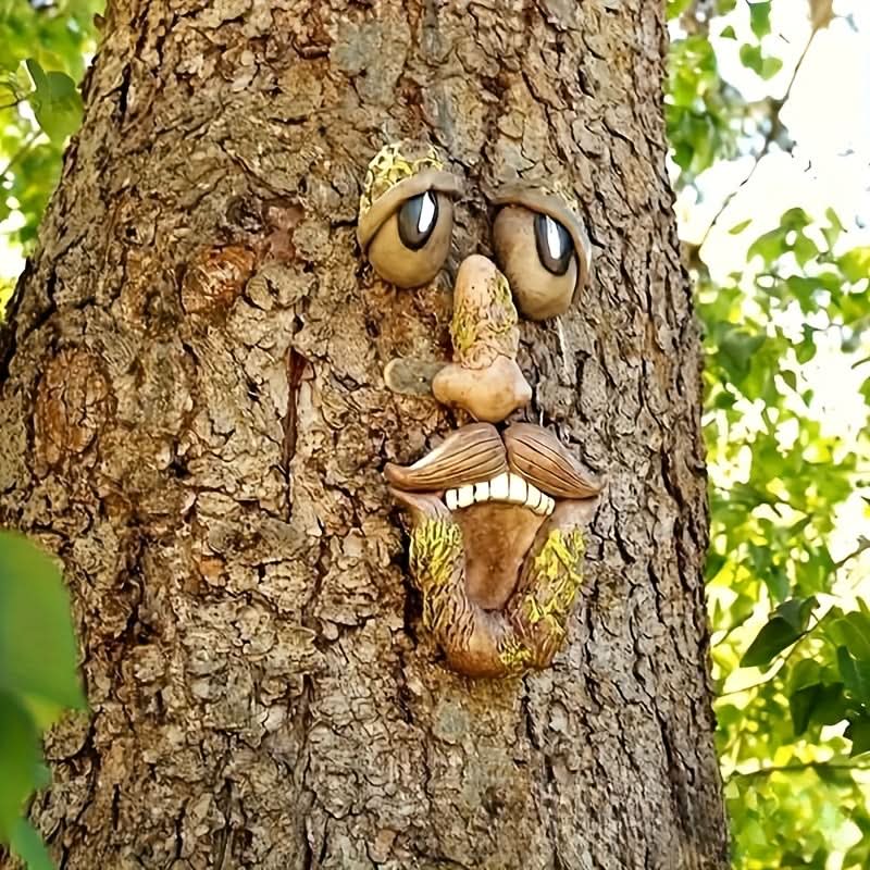 WOODWINK - Whimsical tree face ornament crafted to bring playful character outdoors.