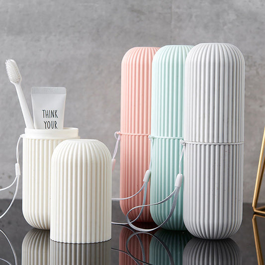 TRAVEL CUP – Portable toothbrush and toothpaste storage case designed for hygienic and compact travel organization