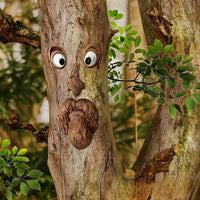 WOODWINK - Whimsical tree face ornament crafted to bring playful character outdoors.