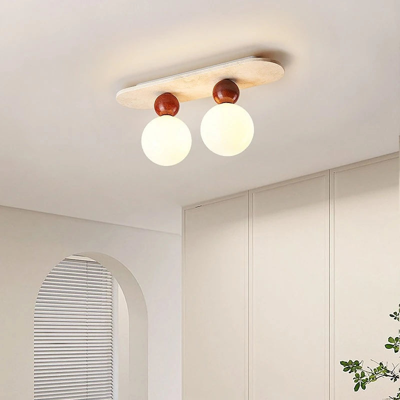 LUMITRAV – Ellipse Travertine Ceiling Light for Soft Modern Interiors