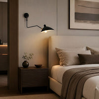 Lampada da parete FLEXARM con braccio orientabile regolabile per un'illuminazione flessibile