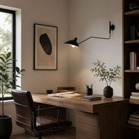 Lampada da parete FLEXARM con braccio orientabile regolabile per un'illuminazione flessibile